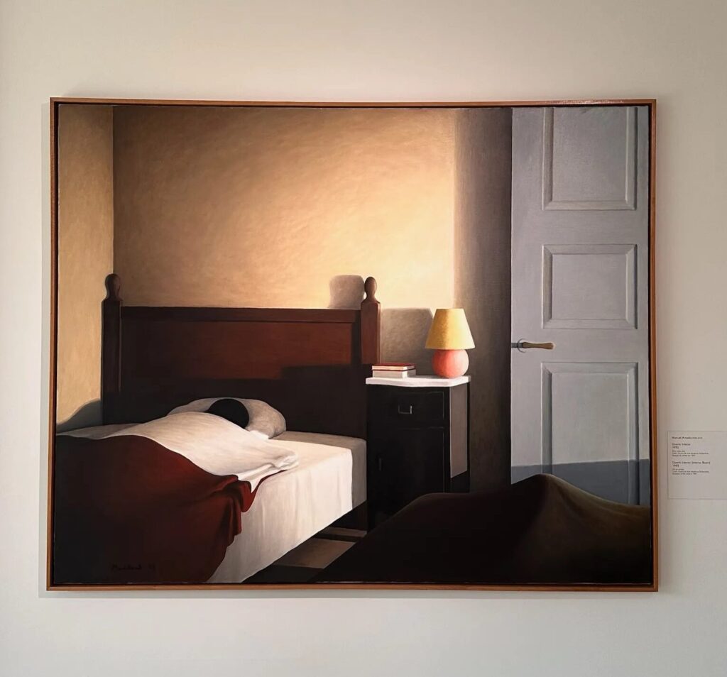 A serene bedroom scene featuring a bed with white sheets, a bedside table with a lamp, and a partially open door, softly lit in warm tones.