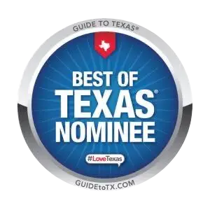 Round, blue badge with a white star and red Texas outline, stating "Best of Texas Nominee" in bold white letters.